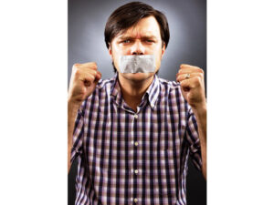 Image of angry man with tape over his mouth