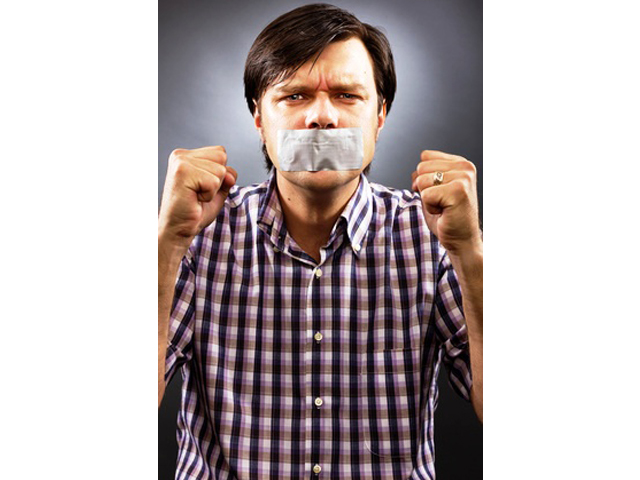 Image of angry man with tape over his mouth