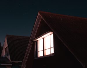Image of a home illuminated at night