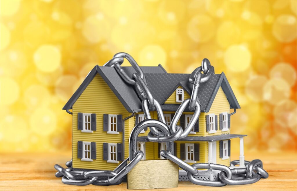 Image of a house in chains