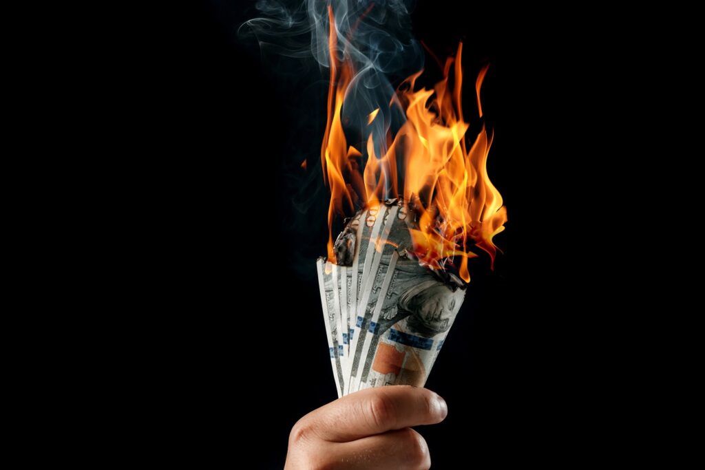 Image of money burning