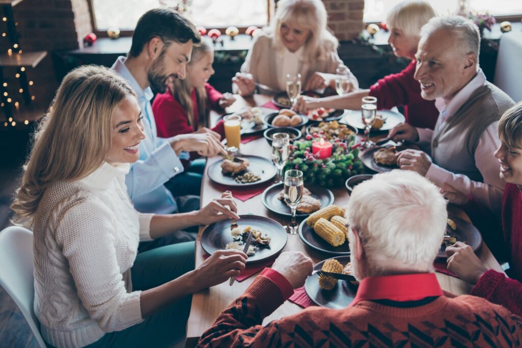 Photo of a age-diverse group enjoying Christmas meal