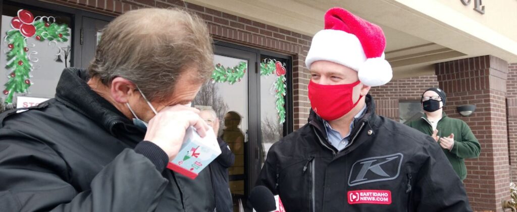 Image of man receiving secret Santa gift