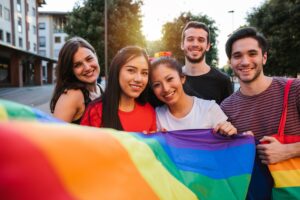 Image of young people with LGBT flag