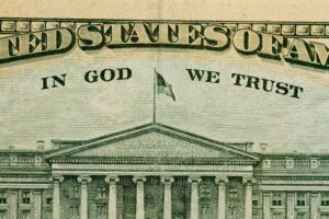 Paper money with words In God We Trust