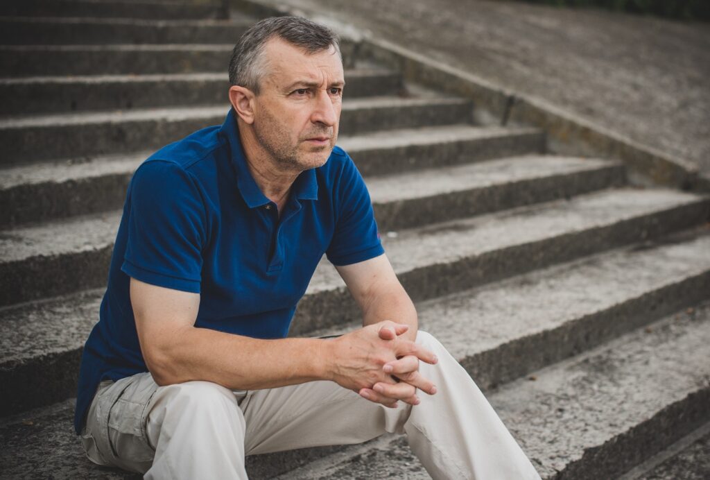 Image of a middle-age man contemplating life.