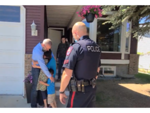 Image of Police arresting pastor Tim Stevens