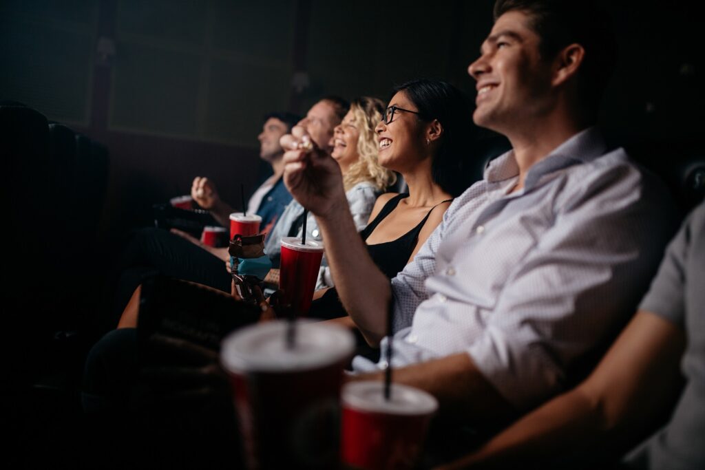 Image of people enjoying a movie in a theater.